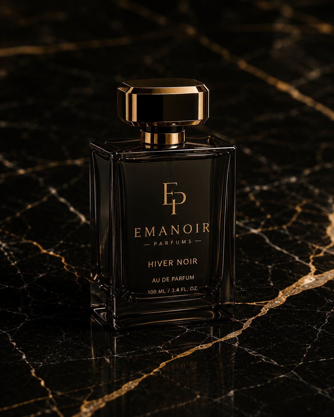 EMANOIR HIVER NOIR — donkere flacon met champagnegouden details